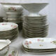Limoges porcelain service decorated with flowers, mid XXth 57 pieces
