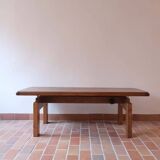 Large solid retractable coffee table