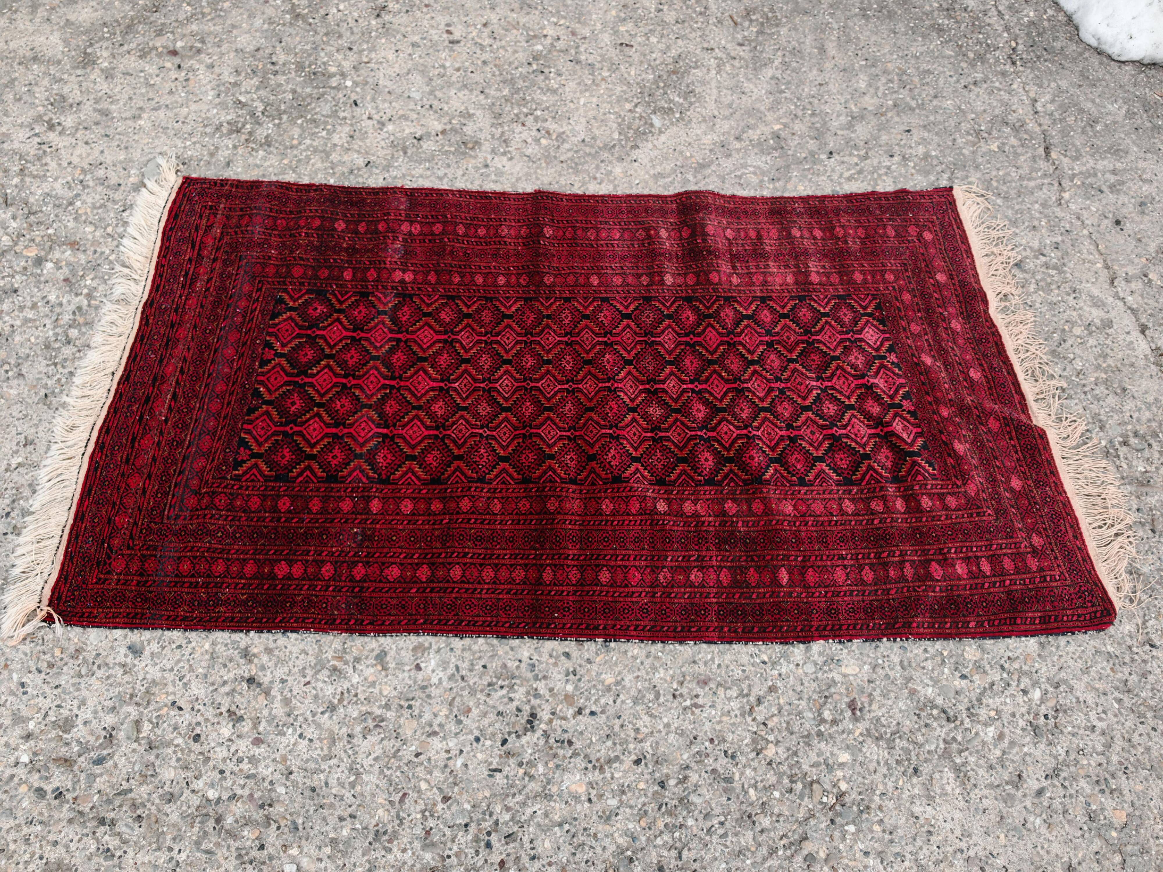 Vintage Baluch carpet handmade from natural wool, Afghanistan 1960.