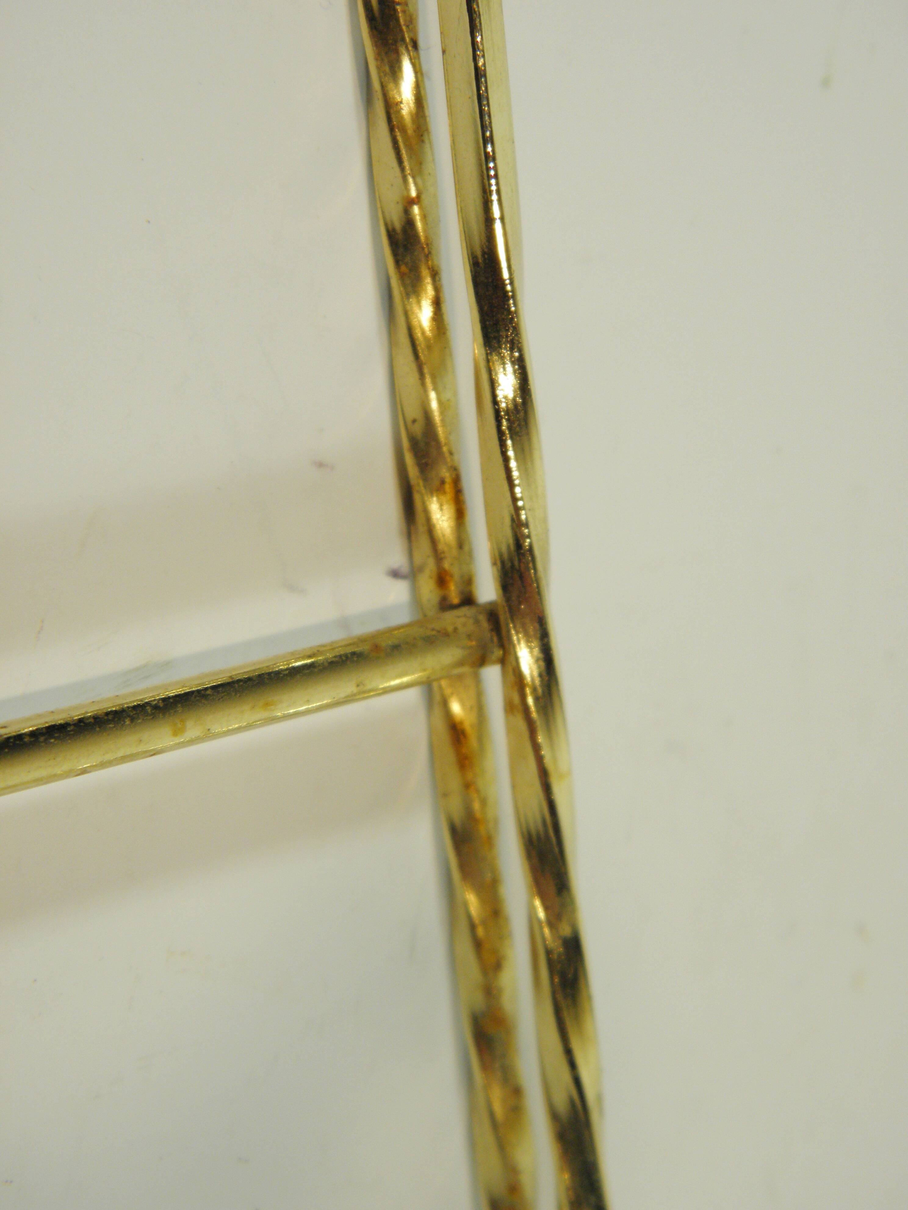 Black and gold metal wall shelf from the 1960s