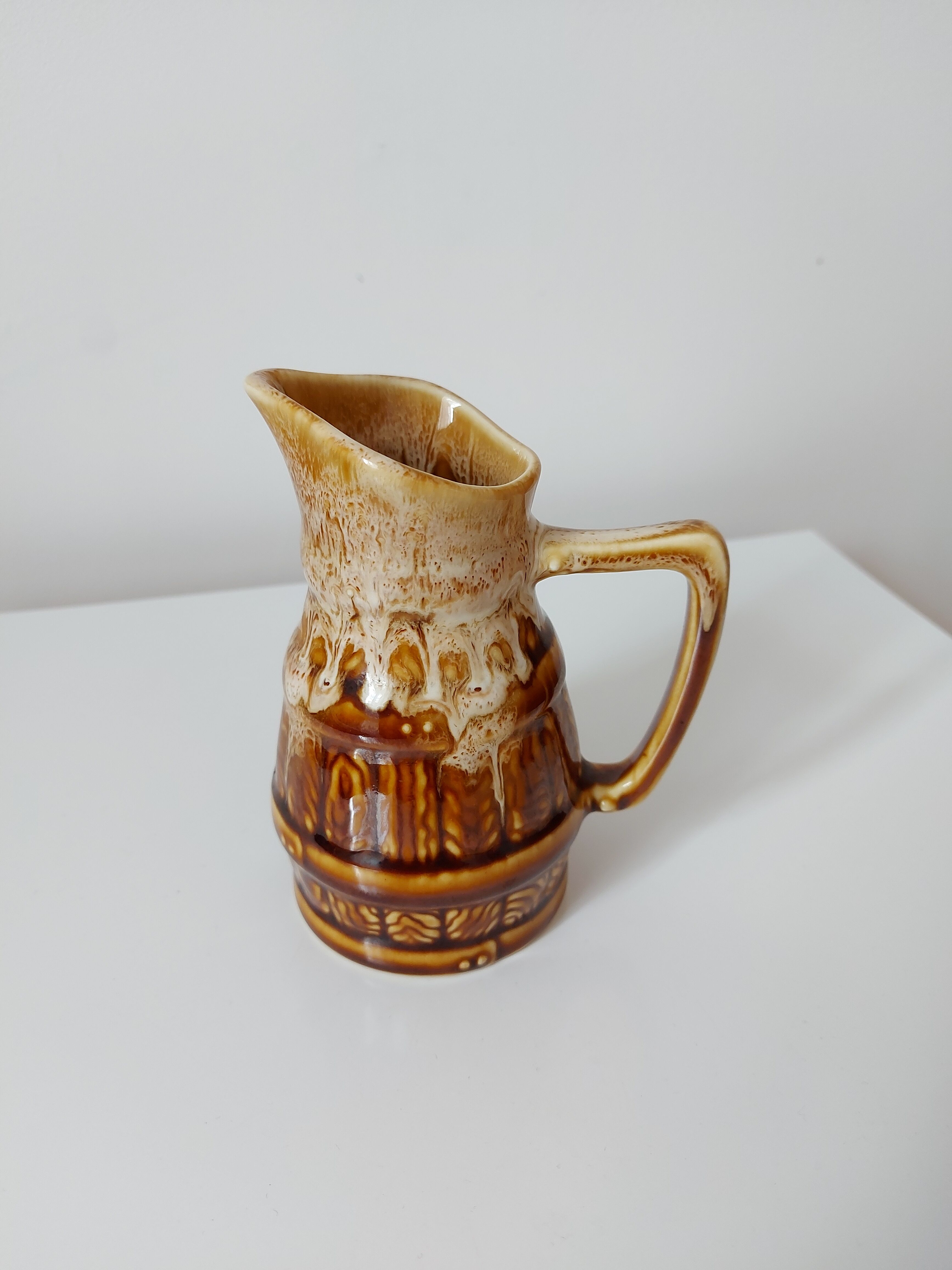 Vintage pitcher revol