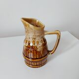 Vintage pitcher revol