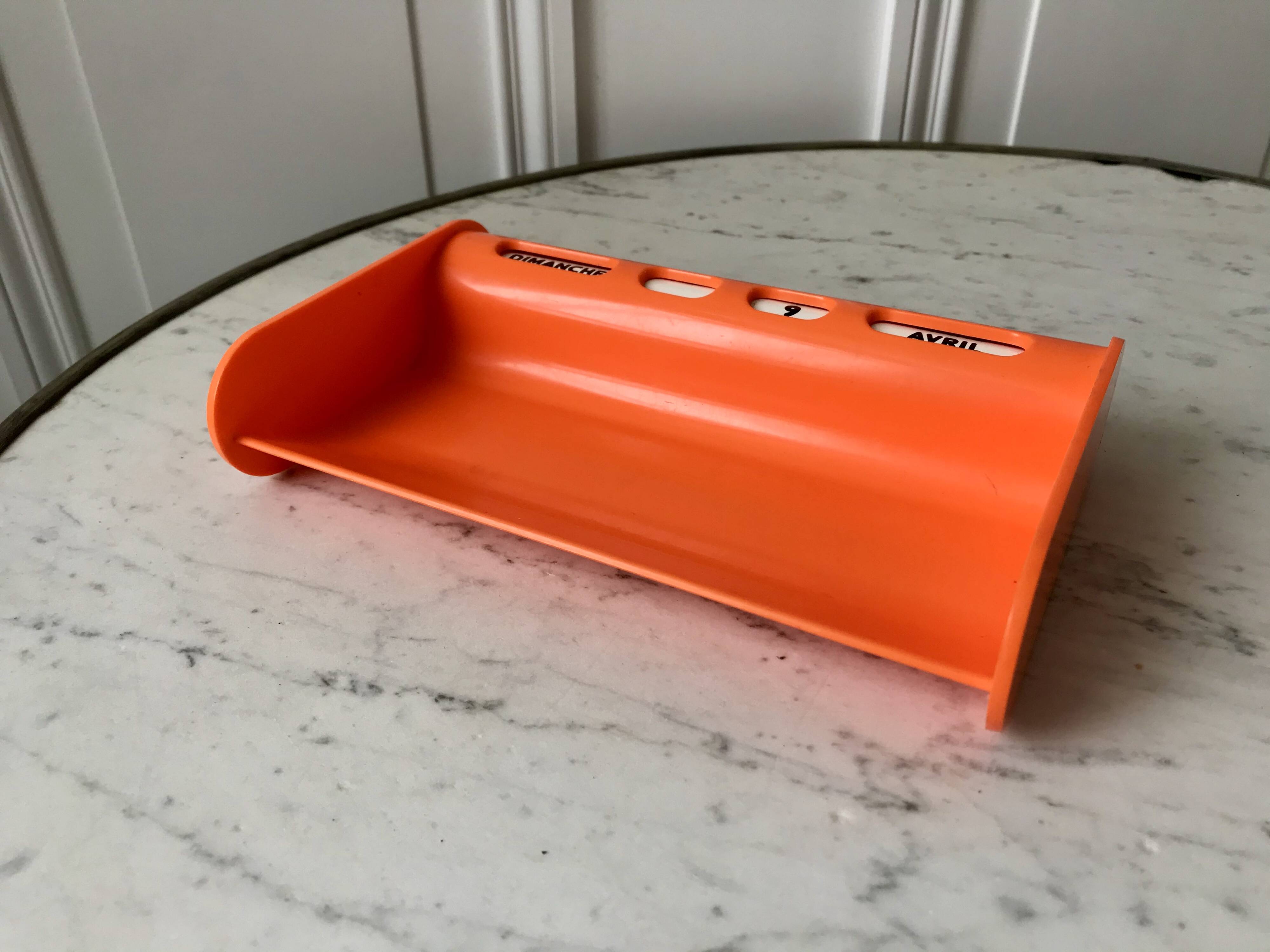 Dater empty pocket in orange plastic seventies 70s