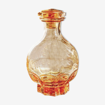 Salmon pink molded glass decanter