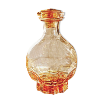 Salmon pink molded glass decanter