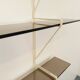 Large vintage wall shelf in smoked glass and white metal in String style.