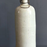 Bouteille en grès moucheté