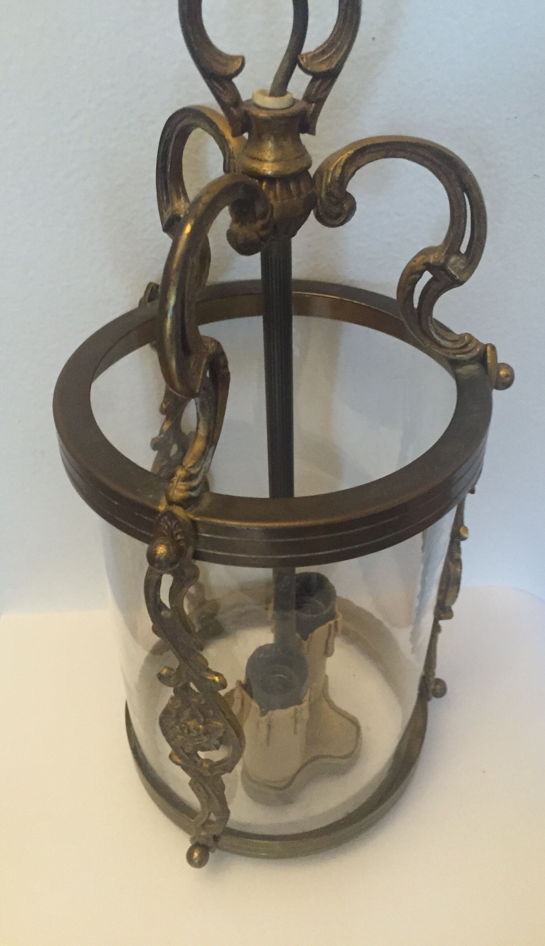 Old lantern in bronze and glass