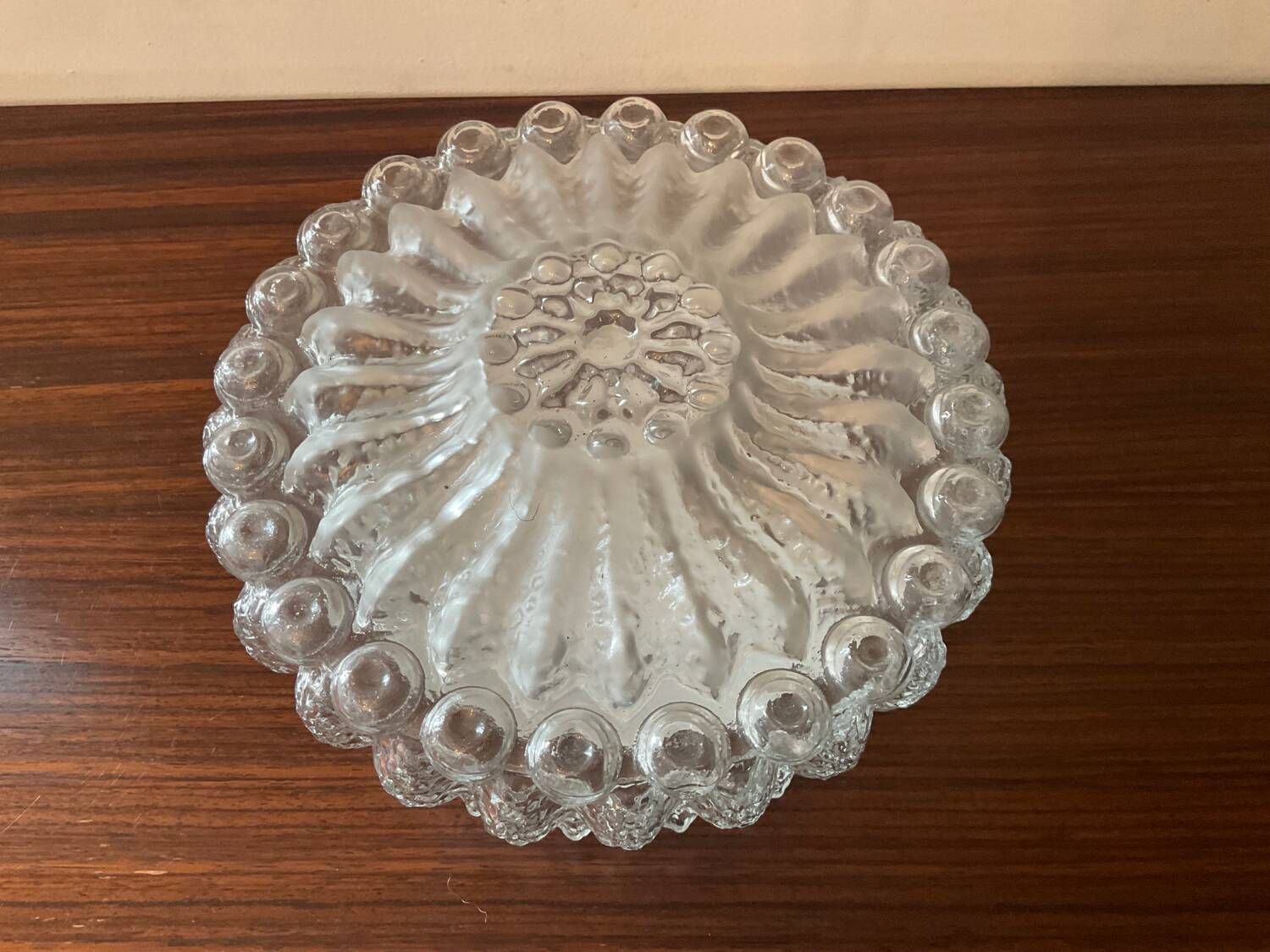 Vintage ceiling or wall light in molded glass from the 70s