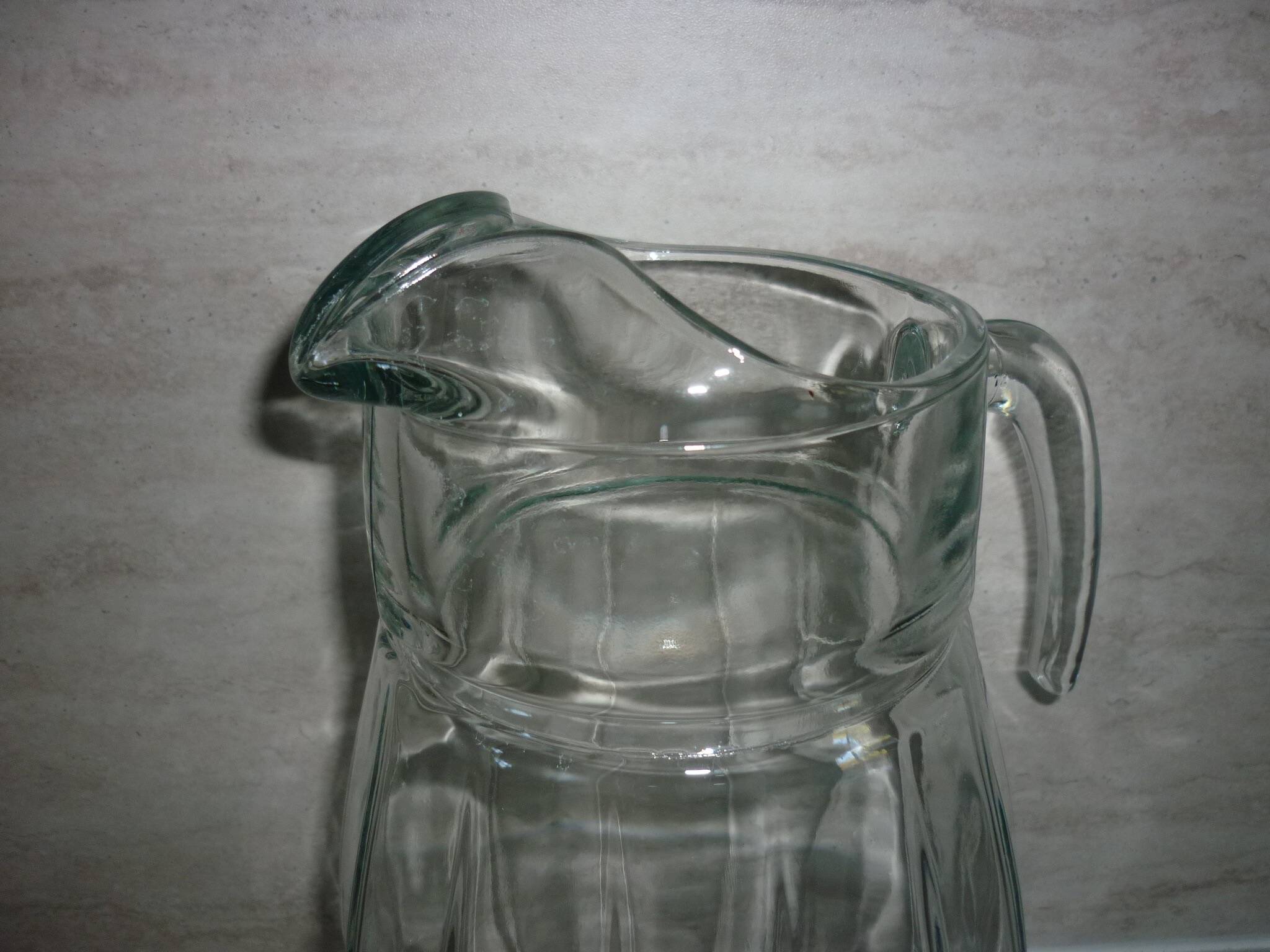 Vintage transparent molded glass carafe with handle