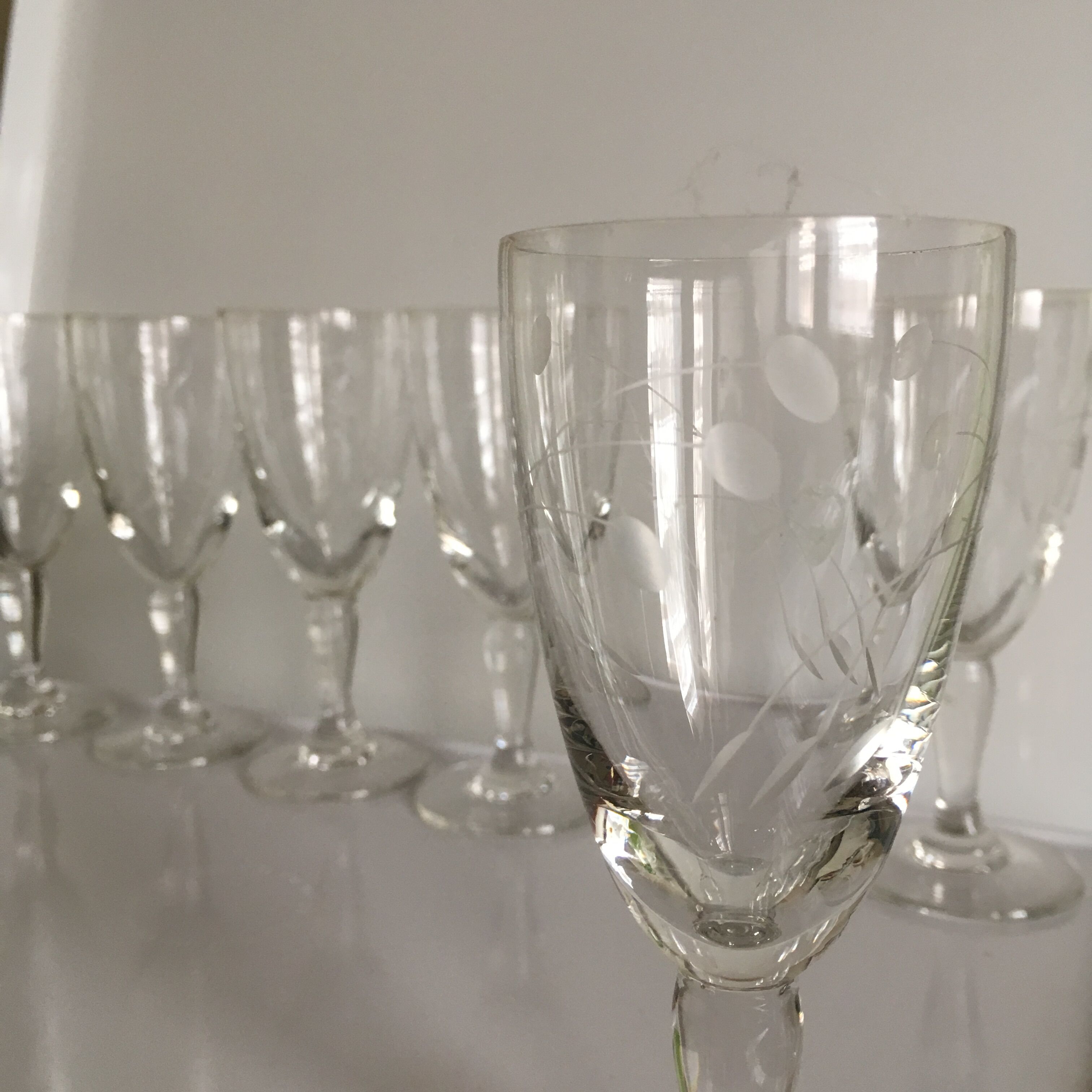 Set of 6 wine glasses etched on foot