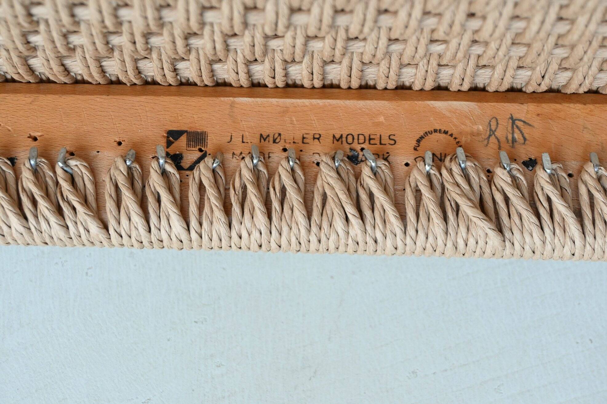 Niels Otto Moller model 66 armchairs teak and paper cord Denmark 1974