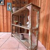 Teak shelves with a green patina