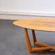 Oval teak coffee table