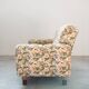 2-seater sofa, floral fabric, wooden structure, plastic and wooden legs, 1970
