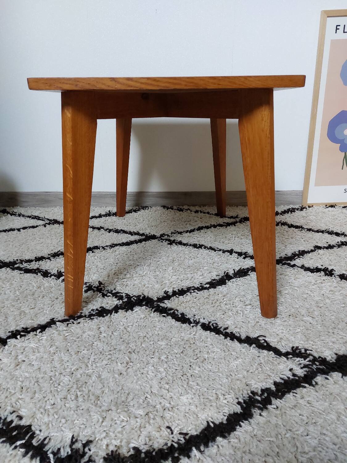 Coffee table with wooden compass legs