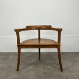 Chalet-style carved wooden tripod armchair