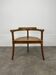 Chalet-style carved wooden tripod armchair