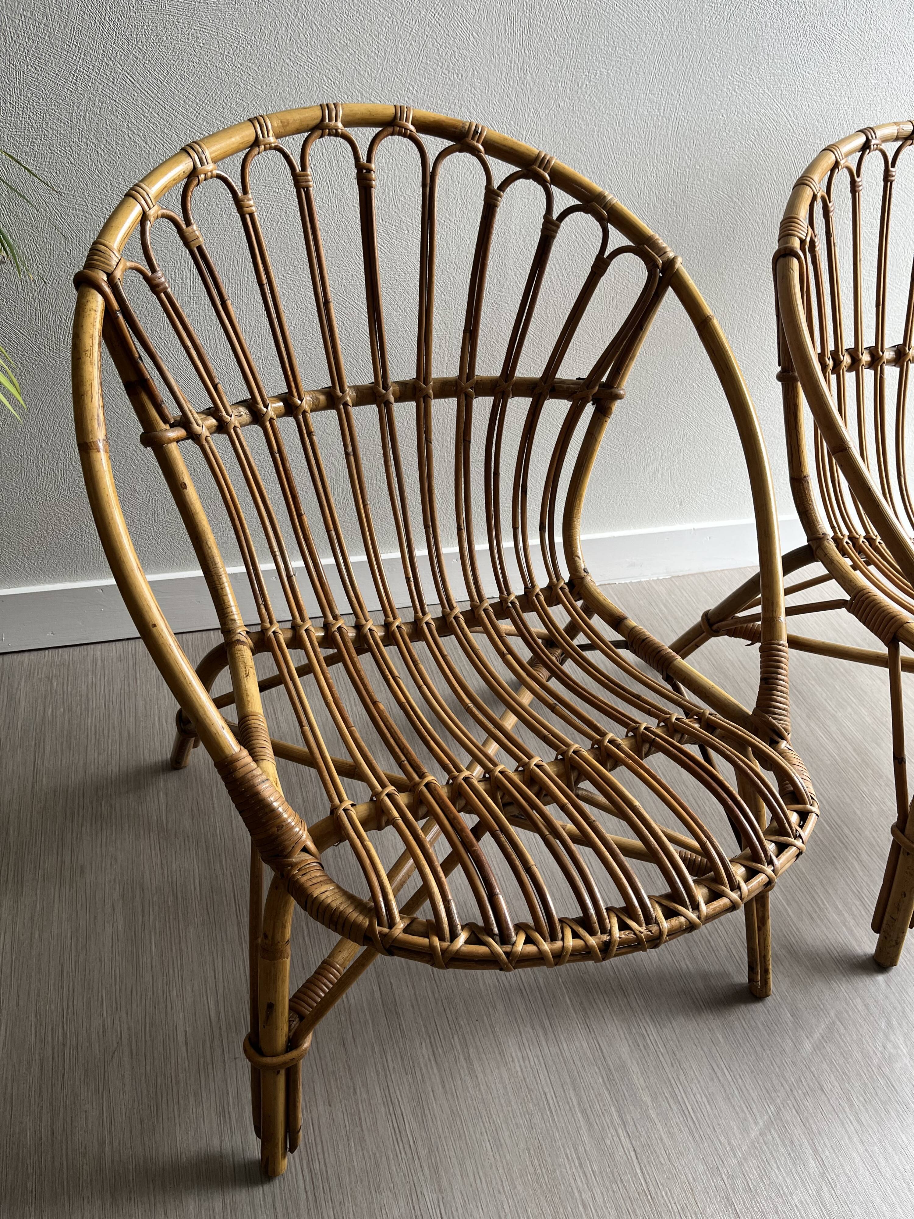 Vintage rattan shell armchairs