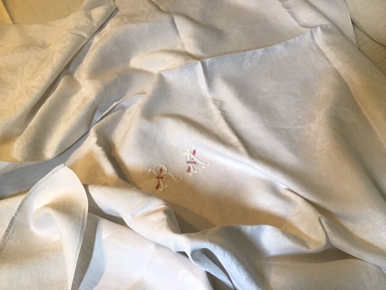 Square linen tablecloth marked RA