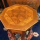 Thuyawood tea table with marquetry decoration.