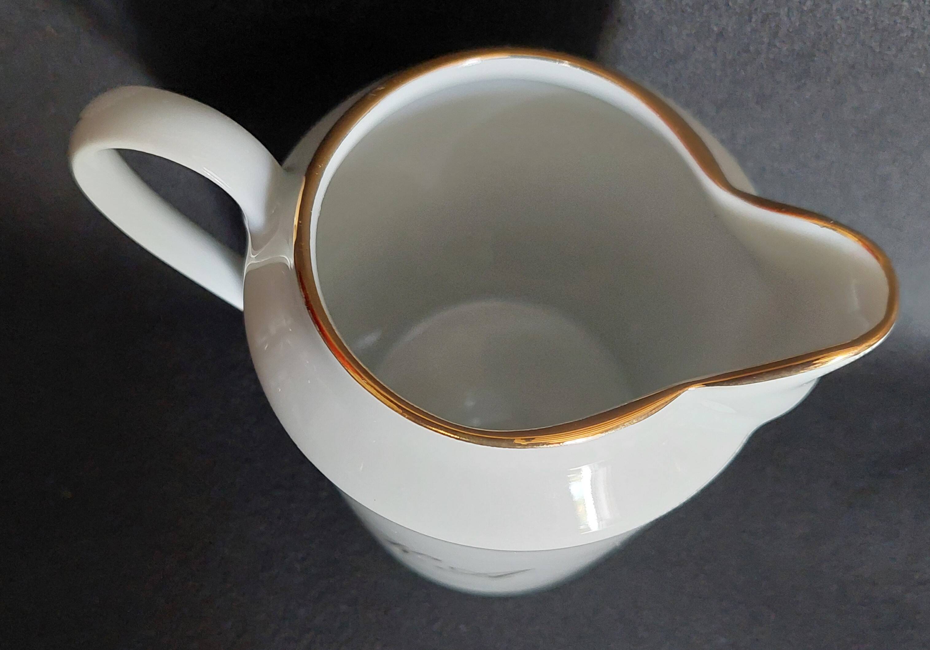 Eight-cup coffee service and creamer, Limoges porcelain, monogrammed