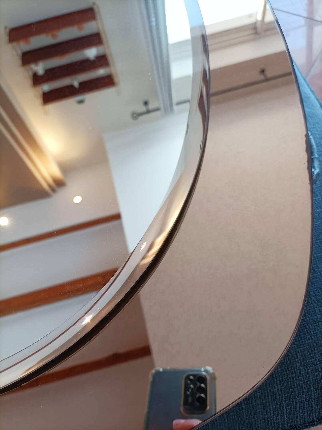 Vintage oval smoked glass mirror