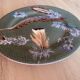 Porcelain plate with feather decoration