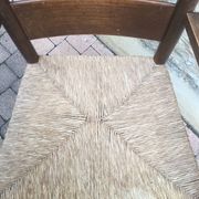 Fauteuil paillé rustique