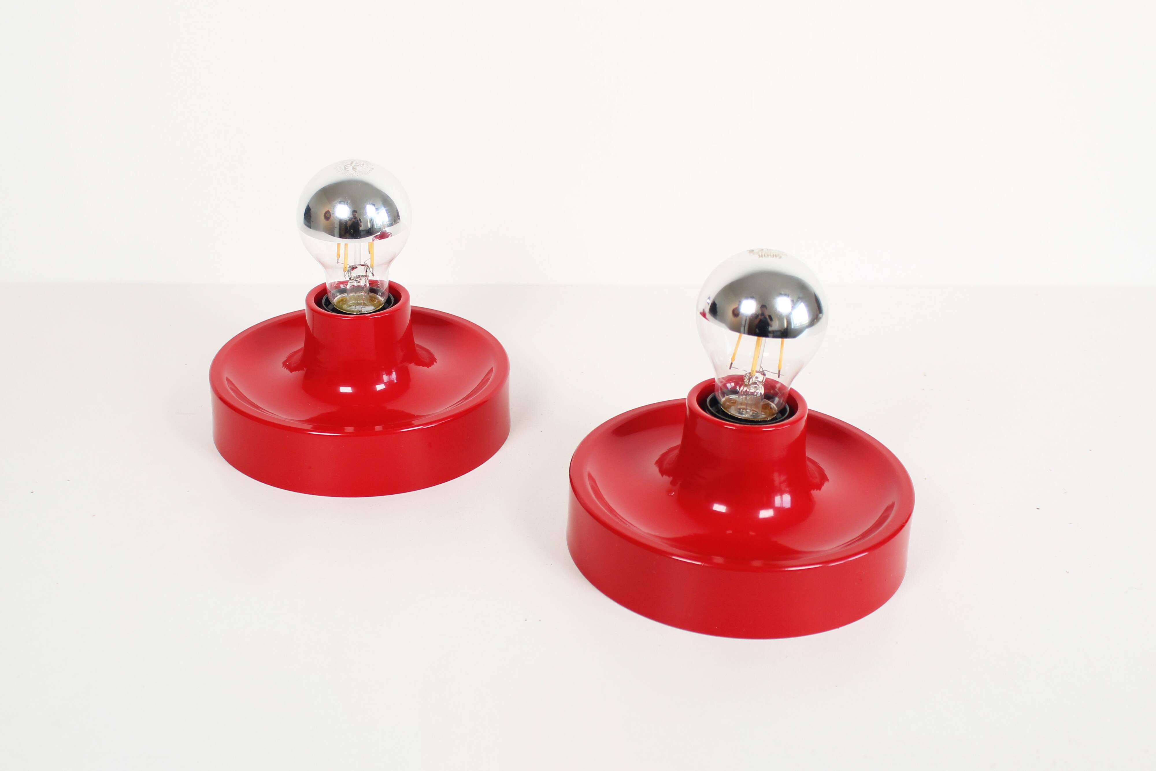 Pair of petite Disc sconces selected by Charlotte Perriand for Les Arcs