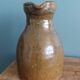 Rustic stoneware jug, chic countryside.