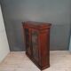 Mahogany wall window