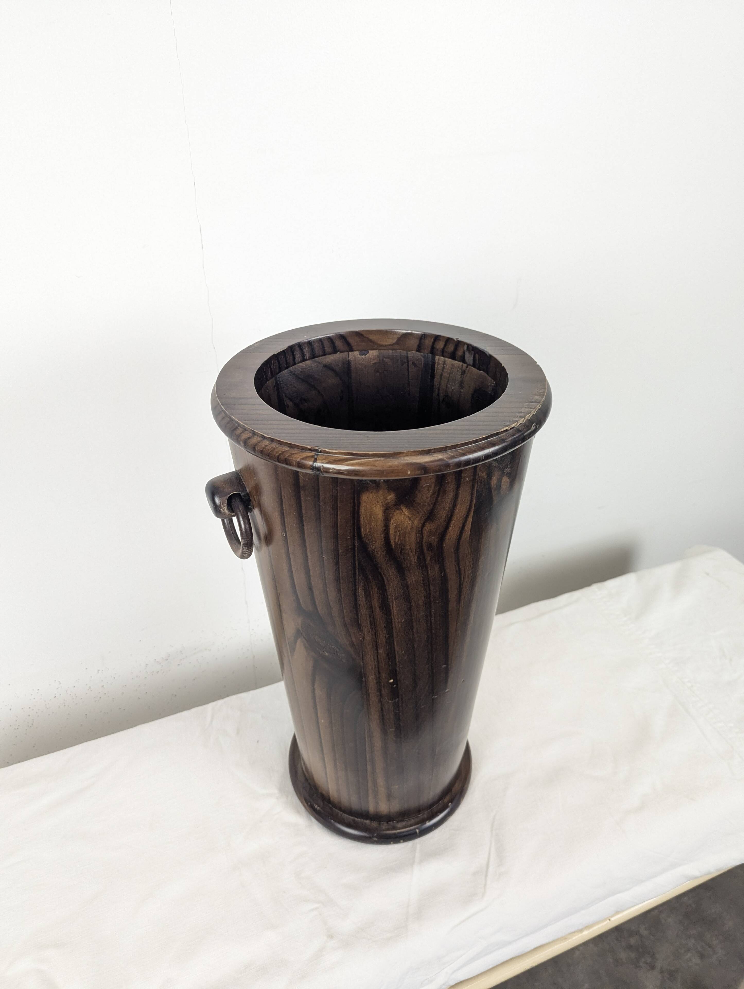 Wooden umbrella stand turned and patinated with iron rings