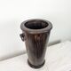 Wooden umbrella stand turned and patinated with iron rings