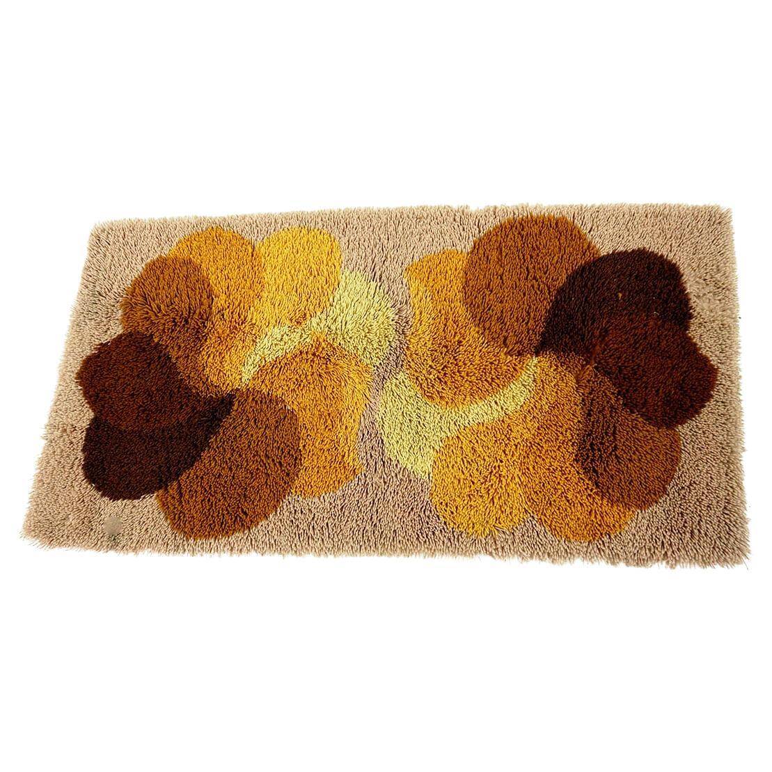 Brown and yellow floral wool carpet by Desso, Netherlands, 1970s.