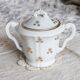 Sucrier ancien en porcelaine PFC France à double anses – Décor fleuri doré