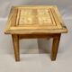 Coffee table on old parquet floor with marquetry
