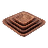 Set of four square nesting wooden empty pocket dishes, 1970s
