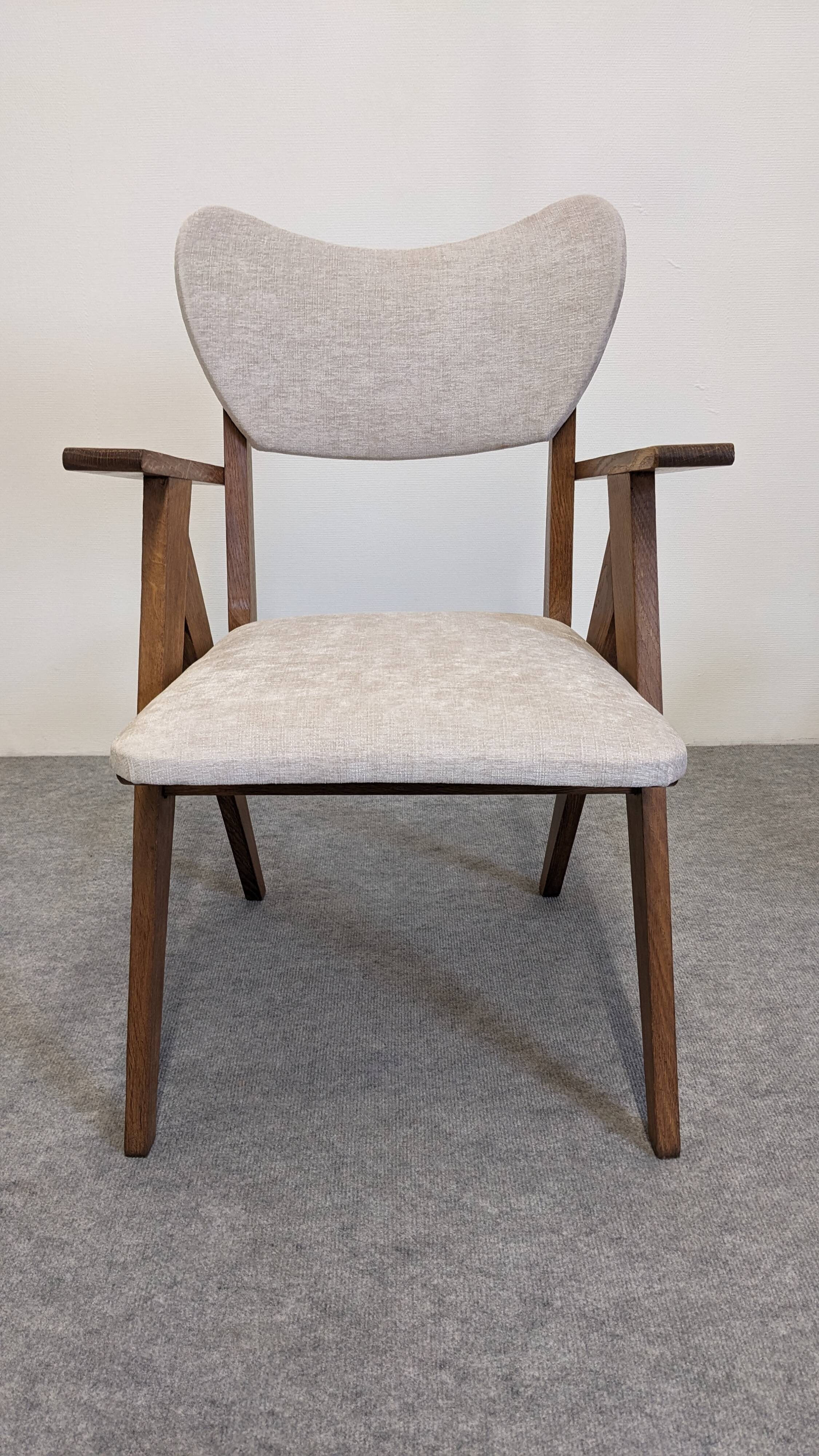 Pair of Scandinavian bridge armchairs in teak, Denmark circa 1950.
