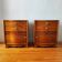 Pair of Art Deco curved bedside tables in light wood.