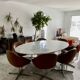Set of 8 Italian design swivel chairs in cognac leather.