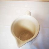 Pitcher with blue frieze