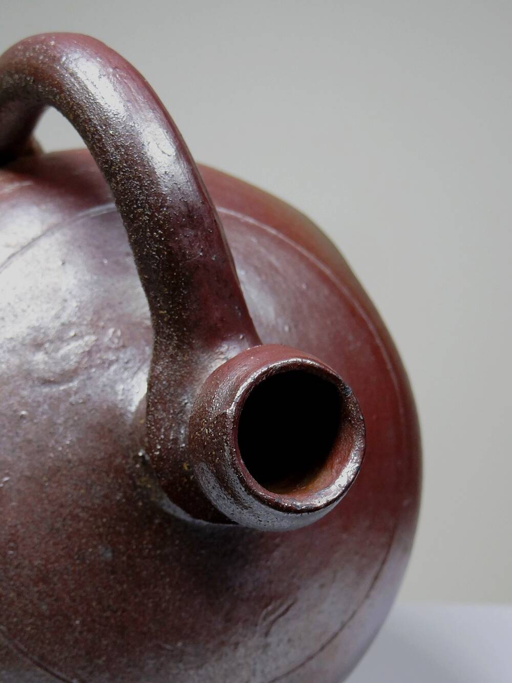 Large stoneware jar from Normandy with lustrous burgundy glaze, from the 1920s-30s.