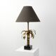Hollywood Regency brass palm tree table lamp with black shade, France, 1970