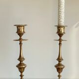 Pair of antique candle holders in solid brass