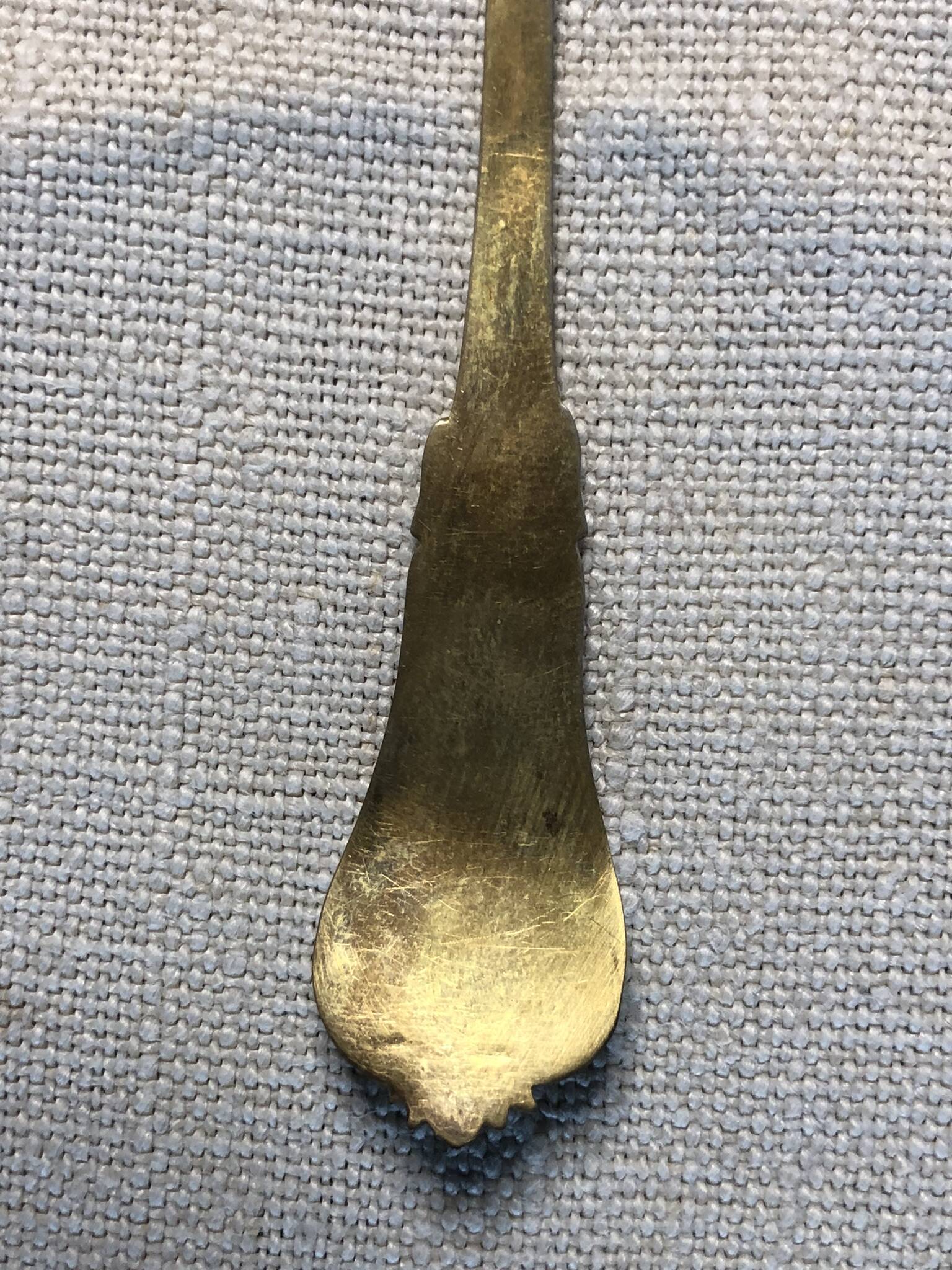 Vermeil (gilded silver) spoons in black wooden box