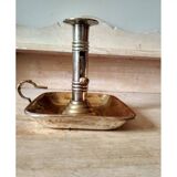 Antique metal and brass hand candle holder on rectangular base