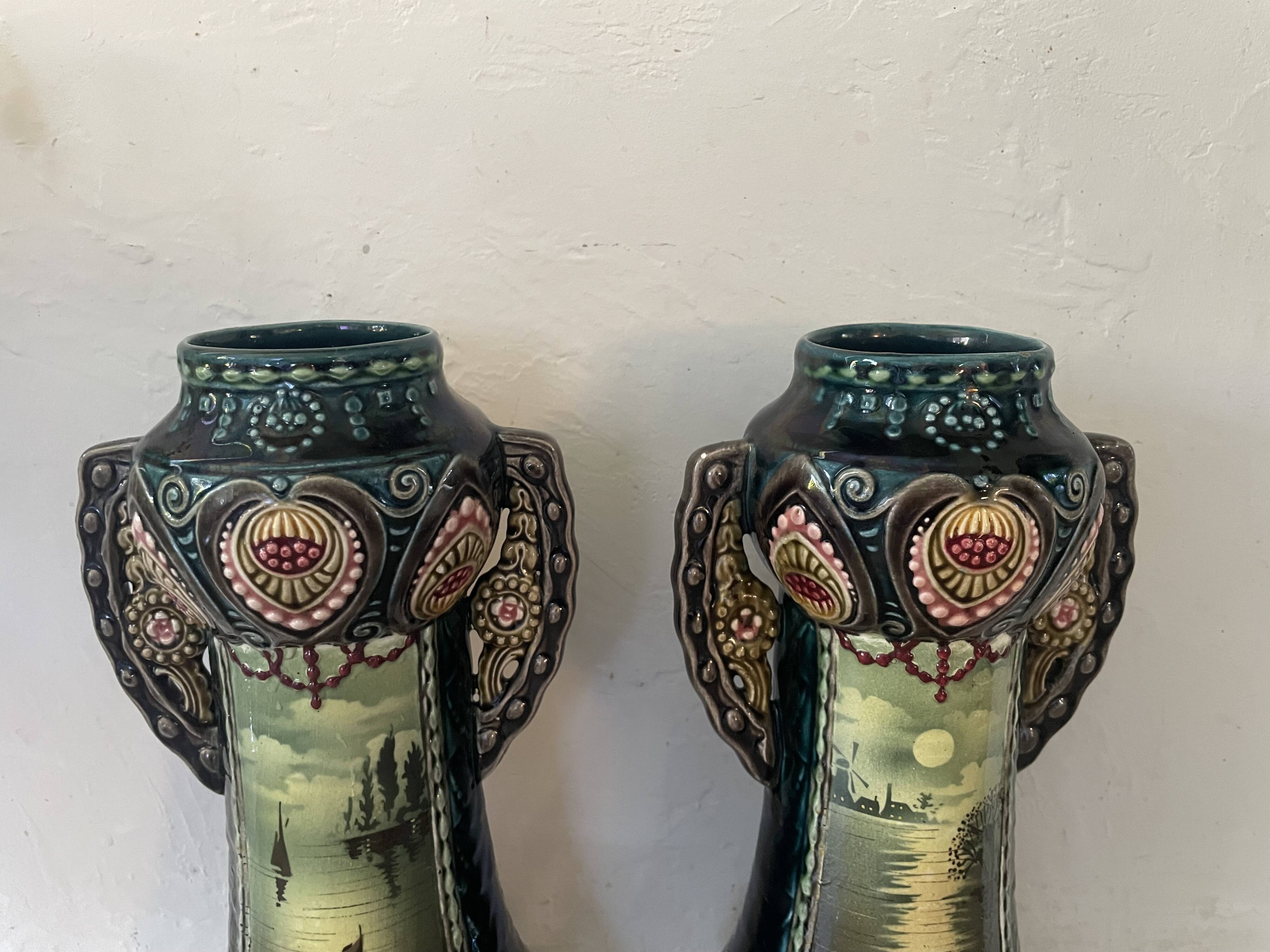 Pair of Art Nouveau slipware vases, hand-painted decoration.