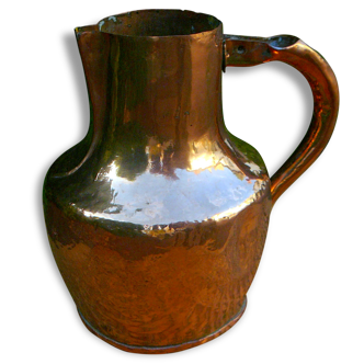 Decorative old copper pitcher