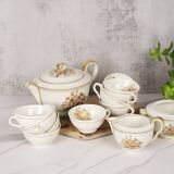 Porcelain tea service by Théodore Haviland, gilded patterns.
